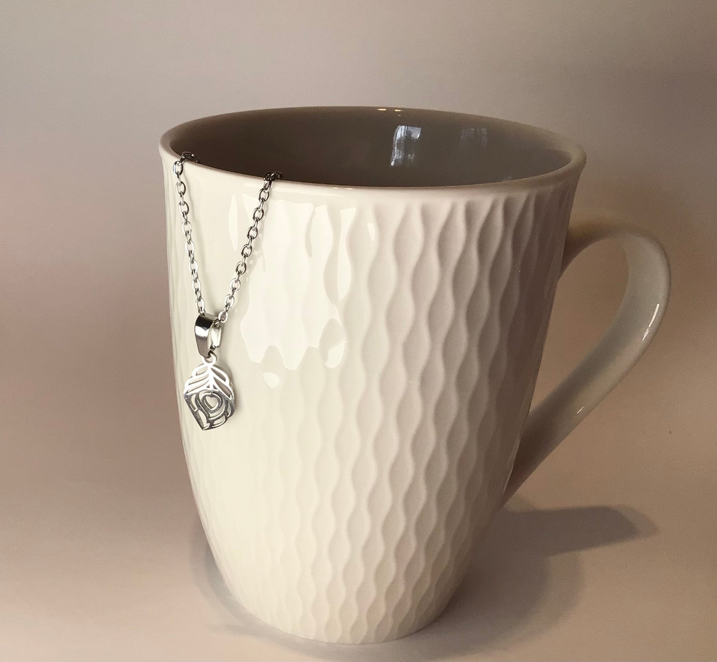 Collier Plume sagesse